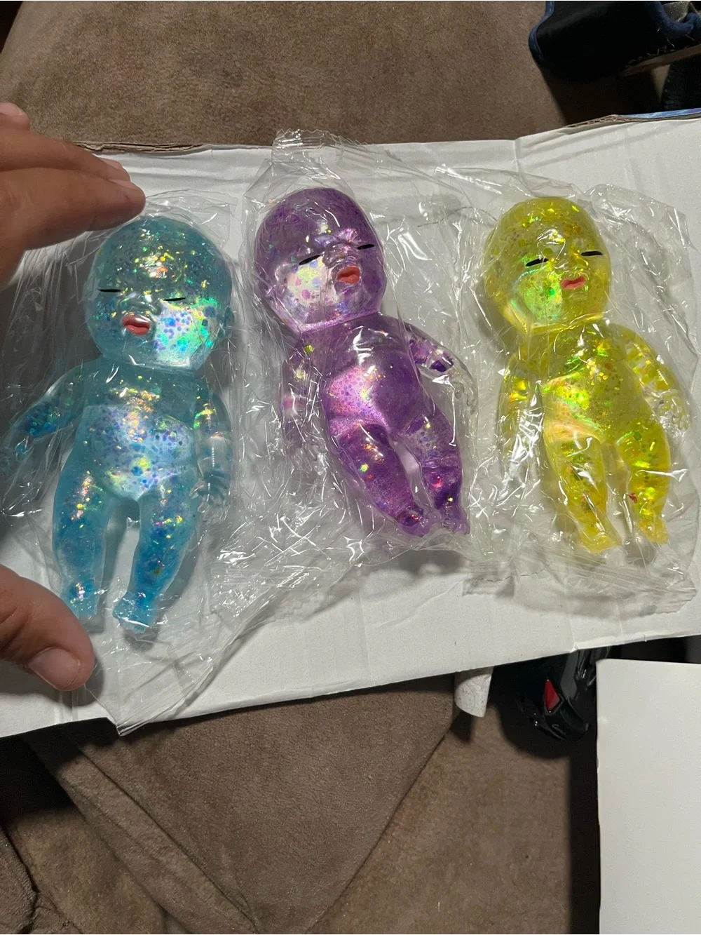 Squeeze Glitter Squishy Baby Dolls - Blue, Purple, Yellow